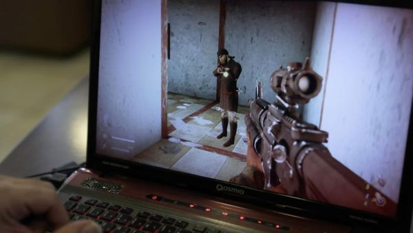 A man plays a computer game created by Hezbollah called "Holy Defence". (AFP/ File Photo)