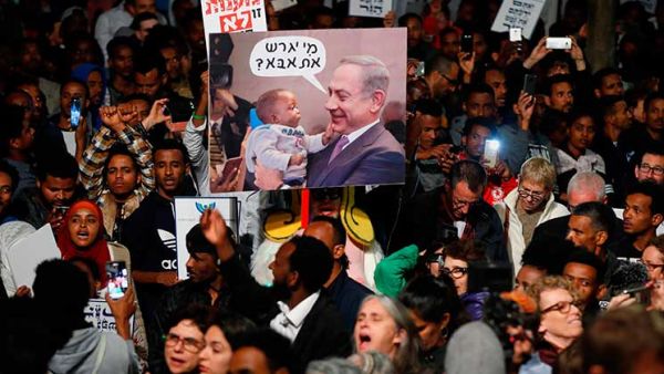 مظاهرة حاشدة ضد خطة حكومية لطرد 40 ألف طالب لجوء أفريقي