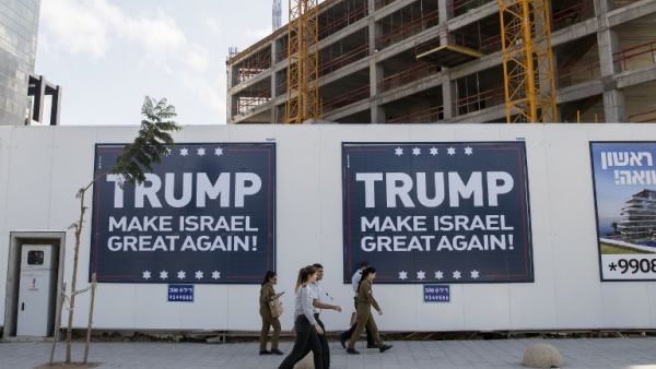 Pro-Trump posters displayed in Tel Aviv (Jack Guez/AFP)