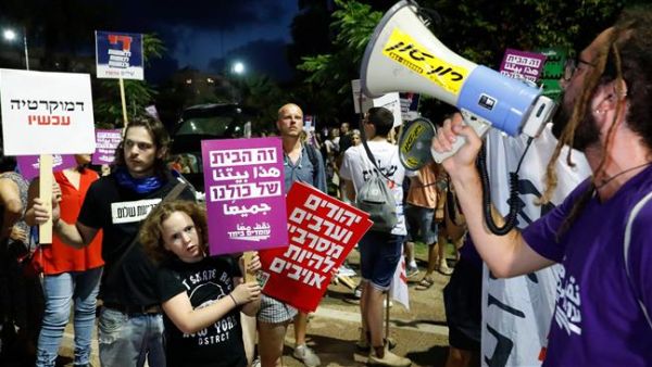 Israelis protest against the contentious nation-state bill in Tel Aviv on July 14, 2018. (AFP/ File Photo)