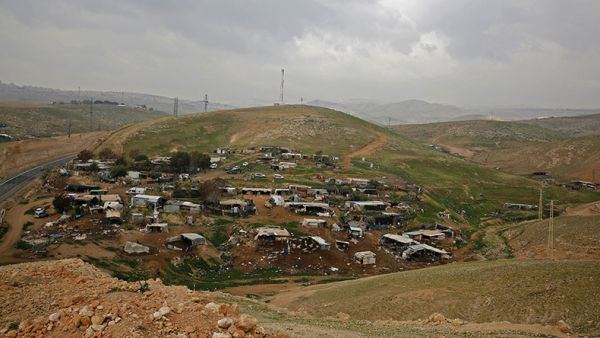 Bulldozers dismantling Khan al-Ahmar (AFP)