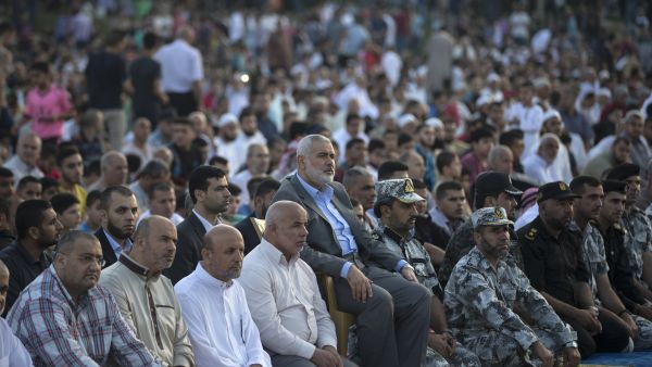Hamas leader Ismail Haniya attends Eid al-Fitr prayers. (AFP)  Hamas leader Ismail Haniya attends Eid al-Fitr prayers. (AFP)