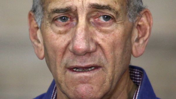 Olmert began serving a 19-month sentence in February 2016, which was later extended to a 27-month sentence.(AFP) 