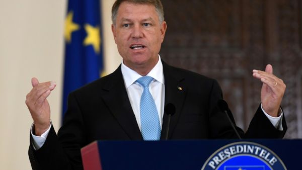 Romanian President Klaus Lohannis says he had not been consulted in the latest government decision to move his country's embassy to Jerusalem. (AFP/ File Photo)
