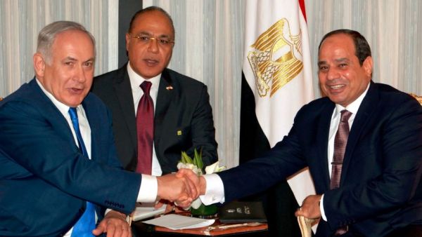 A picture speaks a thousand words - and Egyptians certainly have plenty to say about viral photos of their president’s broad grin during his first public meeting with Israeli Prime Minister Benjamin Netanyahu. (Avi Ohayon/Israeli Government Press Office)