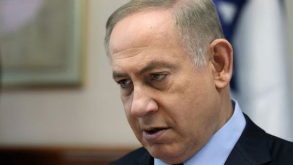 Lieberman stated that calls for a pardon were "ignorance and slogans" following Netanyahu's statement. (AFP/File)