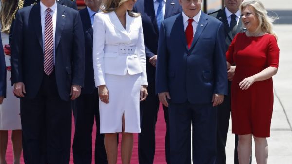 US President Donald Trump (L), First Lady Melania Trump, Israeli Prime Minister Benjamin Netanyahu (C) and his wife Sara are seen upon Trump's arrival at Ben Gurion International Airport in Tel Aviv on May 22, 2017, as part of his first trip overseas. (AFP/Jack Guez)