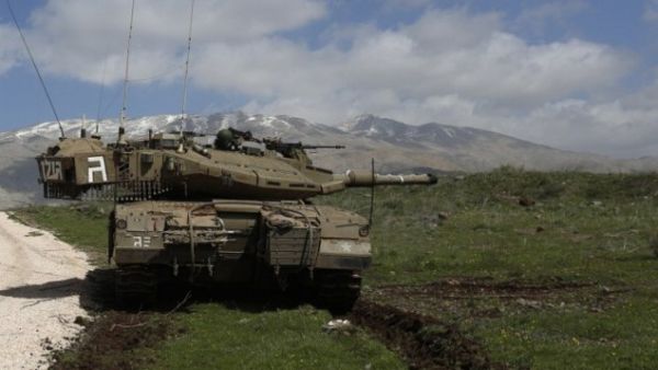 An Israeli tank in the Golan Heights (AFP/Jalaa Marey)