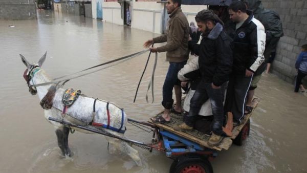 Hundreds of Palestinians had to be evacuated from their homes following severe flooding in the Gaza Valley Sunday. (AFP/File) Hundreds of Palestinians had to be evacuated from their homes following severe flooding in the Gaza Valley Sunday. (AFP/File)
