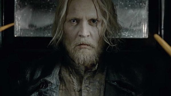 Unrecognisable: The sequel follows the Dark wizard Gellert Grindelwald - played by a grizzled Johnny Depp - escaping from the Magical Congress of the United States of America (Source: Warner Bros.)