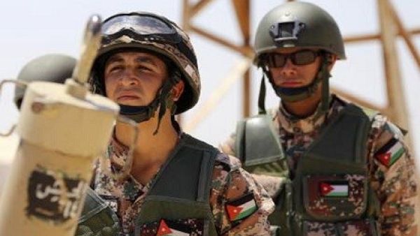 Jordanian soldiers stand guard near the Syrian border. (AFP/ File)