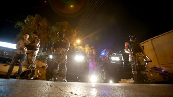 A Jordanian was killed, and another was injured along with an Israeli man on Sunday in a shooting incident at the Israeli embassy in Amman (Khalil Mazraawi/AFP)