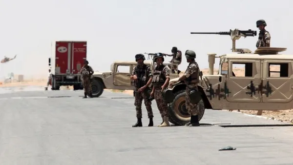 Jordanian soldiers at the al-Karameh border point with Iraq on 25 June 2014 (AFP)