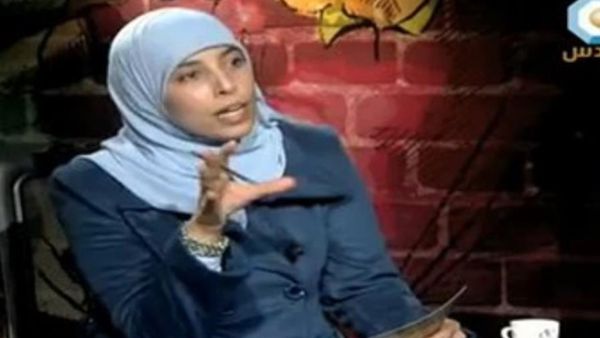 Jordanian Ahlam al-Tamimi hosting a talk show interviewing a Hamas member. (File photo)