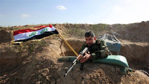 A Kurdish fighter holds a position near Kirkuk, Iraq. (AFP/File) A Kurdish fighter holds a position near Kirkuk, Iraq. (AFP/File)