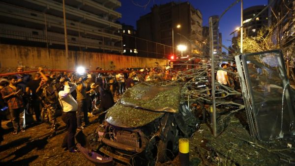 An explosive device hidden in plants outside BLOM bank headquarters in the Verdun neighborhood went off shortly after 8 pm on a mainly deserted street last night. (AFP/Anwar Amro)