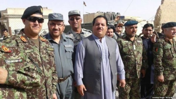 Helmand's security chief Abdul Jabar Qahraman (C) surrounded by police and army officers. (Social Media)