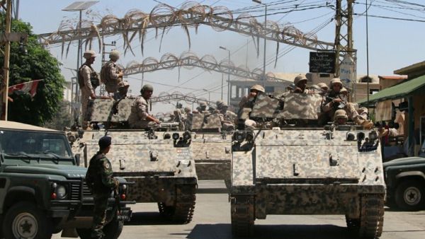 Lebanese forces on patrol in a northern border village following a militant attack. (AFP/File)