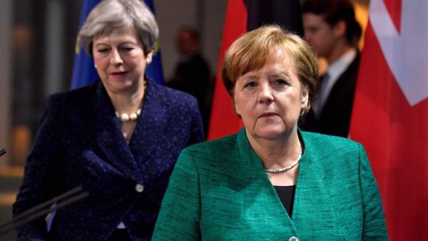 German Chancellor Angela Merkel and British Prime Minister Theresa. (AFP/File)