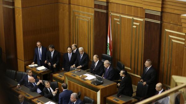 Newly elected Lebanese President Michel Aoun (C) waits next to the Parliament Speaker Nabih Berri (R) at the Lebanese parliament in Beirut. (Joseph Eid / AFP)

