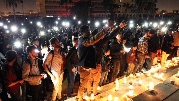 People attend an 'Earth Hour' event in Benghazi, Libya, to draw awareness to climate change. (AFP/Abdullah Doma)