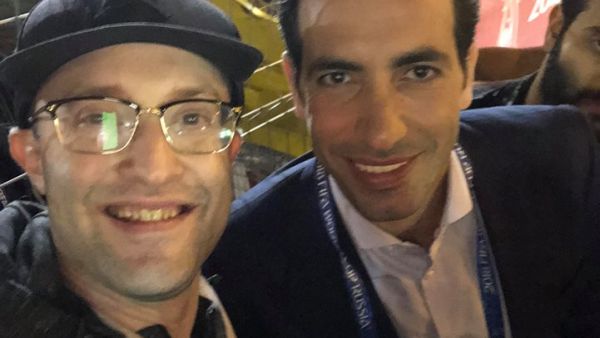 The photograph that was shared by the Israeli Roi Kais on Twitter showing Mohamed Aboutrika with an Israeli fan in Moscow. Aboutrika apologized later as he did not realize the fan was Israeli. (Twitter)