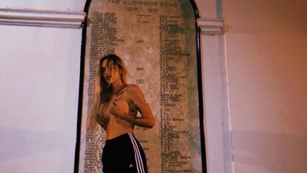 The 31-year-old singer said the pictures were taken inside the grounds of a London church while she was drunk (Twitter)