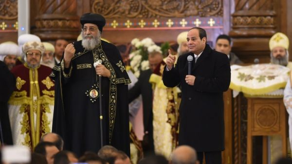 Sisi taking part in the opening ceremony of the church along with the Coptic Pope Tawadros II. (AFP)