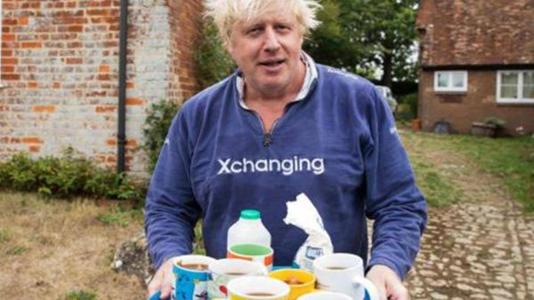 A screenshot taken from the video when Boris Johnson appeared holding tea for journalists outside his home.