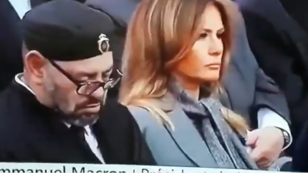 Screenshot from the footage shared widely on social media for the Moroccan King while falling asleep during Macron's speech.