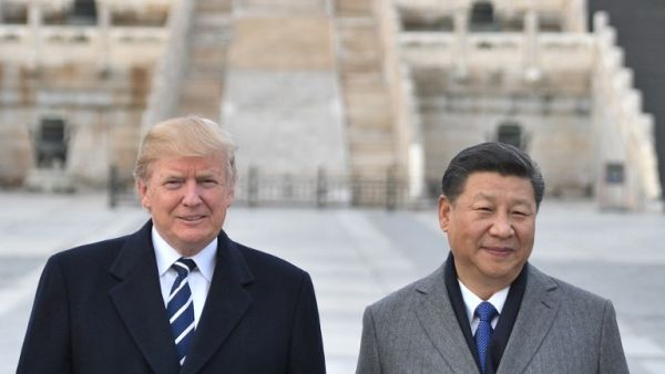 US President Donald Trump, and Chinese President Xi Jinping pose at the Forbidden City in Beijing. (Jim WATSON / AFP)