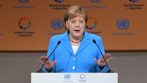 German Chancellor Angela Merkel speaks at the United Nations conference on migration in the Moroccan city of Marrakesh on December 10, 2018. (FETHI BELAID / AFP)