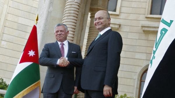Iraqi President Barham Saleh (R), receives Jordan's King Abdullah II in the capital Baghdad on January 14, 2019, in the monarch's first trip to Iraq in more than a decade.(AFP/ File)
