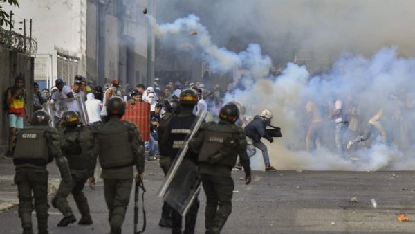 Opposition demonstrators clash with security forces during a protest against the government of President Nicolas Maduro. (AFP/ File)