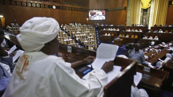 Sudanese parliament members are seated in the main chamber of the National Assembly during an emergency session discussing a state of emergency declared by the president following anti-government protests, on March 11, 2019. (AFP/ File Photo)