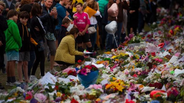 People pay their respects at a memorial site at the Botanical garden in Christchurch on March 18, 2019, three days after a shooting incident at two mosques. (AFP/ File)