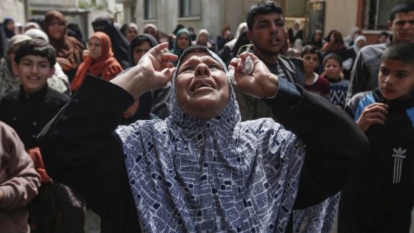 Relatives of 24-year-old Palestinian Jehad Hararah, who was killed in clashes following a demonstration at the Israeli-Gaza border fence, mourn during his funeral in Gaza City on March 23, 2019. (AFP/ File Photo)