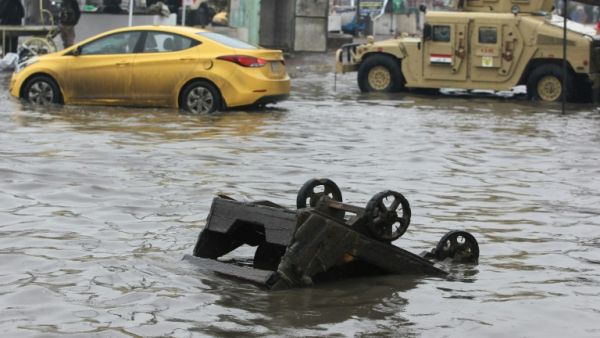 Iraq is one of the hottest countries on earth but when heavy rains do hit they can result in casualties and widespread damage. (AFP)