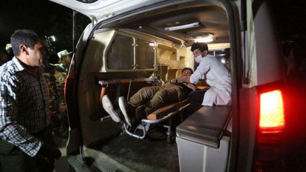An injured Afghan man lies on a stretcher in an ambulance near the site of an explosion. (AFP/ File Photo)