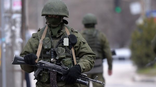 Russian soldiers patrol outside the navy headquarters in Simferopol. (AFP/ File Photo)