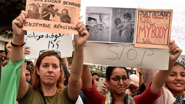 Moroccans chant slogans in Casablanca on August 23, 2017, during a protest against sexual harrasment following the sexual assault of a woman on a bus (AFP)