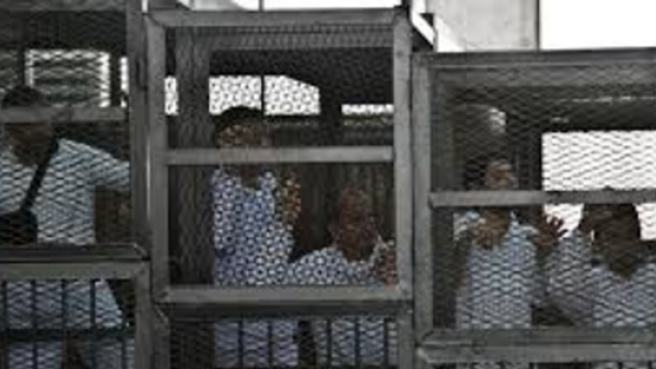 Muslim Brotherhood members await trial. (AFP/Khaled Desouki)