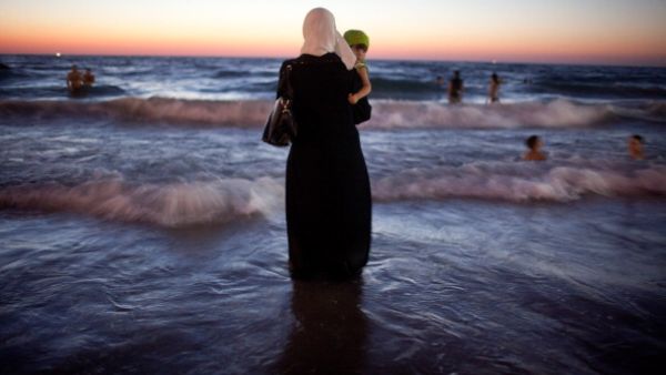 Whether or not it's part of a larger movement toward gender and sexuality rights in Lebanon, the "Gender Dictionary" is a groundbreaking booklet aiming to explain topics like gender norms and feminism in side-by-side Arabic and English.  (AFP/Uriel Sinai)
