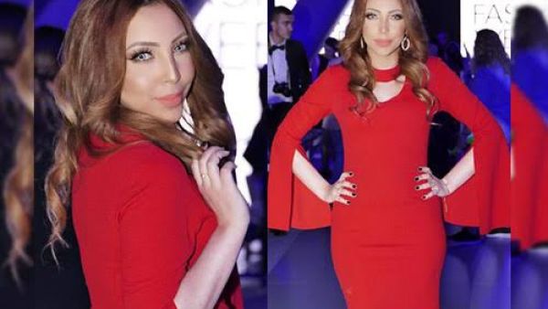 الفنانة هاجر فؤاد بفستان أحمر ساحر بـ أسبوع الموضة في دبي