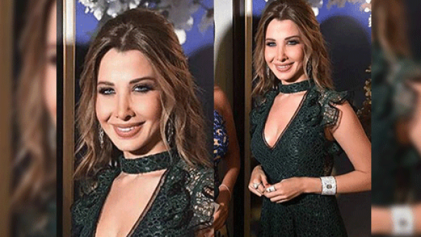 ارتدت نانسي عجرم فستان شبكي شفاف باللون الأخضر الداكن