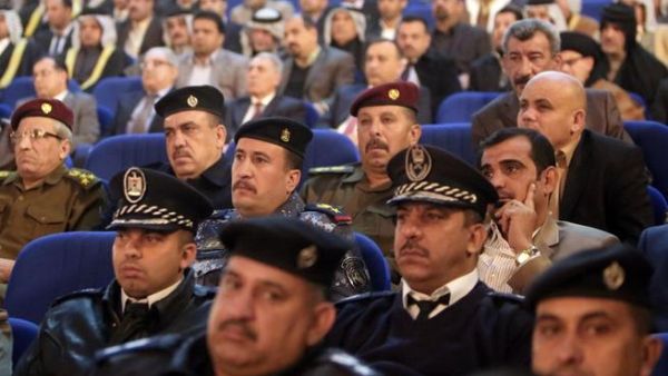 Members of the Iraqi army listen to a speech by Iraqi Prime Minister Nuri al-Maliki during a political meeting to talk about the ongoing fighting between security forces and al-Qaeda-linked groups.  [AFP]