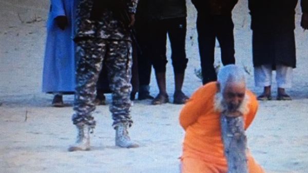 A screengrab allegedly shows the militants standing behind Abu Haraz. (File photo)