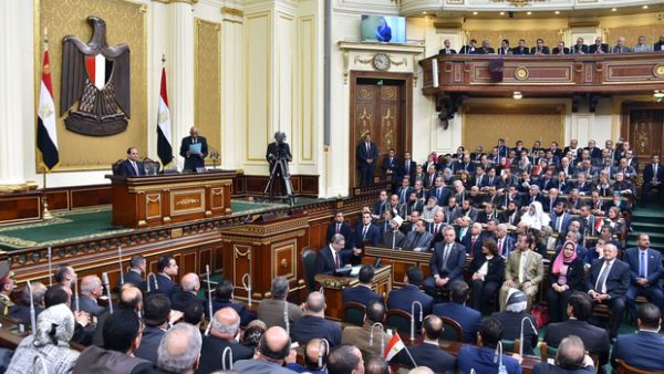 Egyptian President Abdel Fattah al-Sisi (top-L) listening as Ali Abdel Aal (top-R), speaker of Egypt’s parliament, delivers a speech to the parliament headquarters in Cairo, 23 February, 2016. (AFP/HO/Egyptian presidency) 