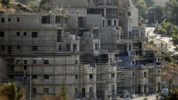 Buildings under construction in the Jewish settlement of Kiryat Arba outside Hebron, July 6, 2016. (AFP/File)