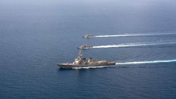 A file image released by the US Navy shows a guided-missile destroyer USS Mason (DDG 87) conducting formation exercises with the Cyclone-class patrol crafts USS Tempest (PC 2) and USS Squall (PC 7) on September 10, 2016. (AFP/Navy Visual News Service)